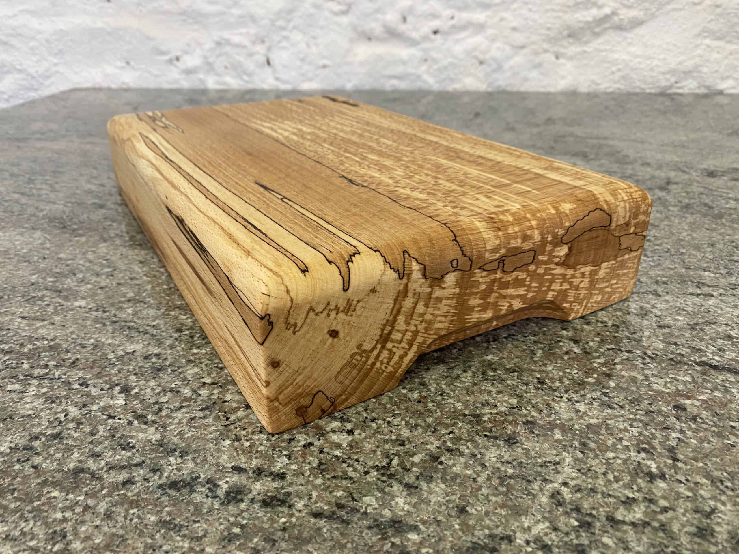 Round Top Spalted Beech Chopping Board 4 Close up angle view of this Large Round Top English Spalted Beech Chopping Board, handcrafted by Crystal Woods, finished in food safe oil, locally sourced wood in Devon