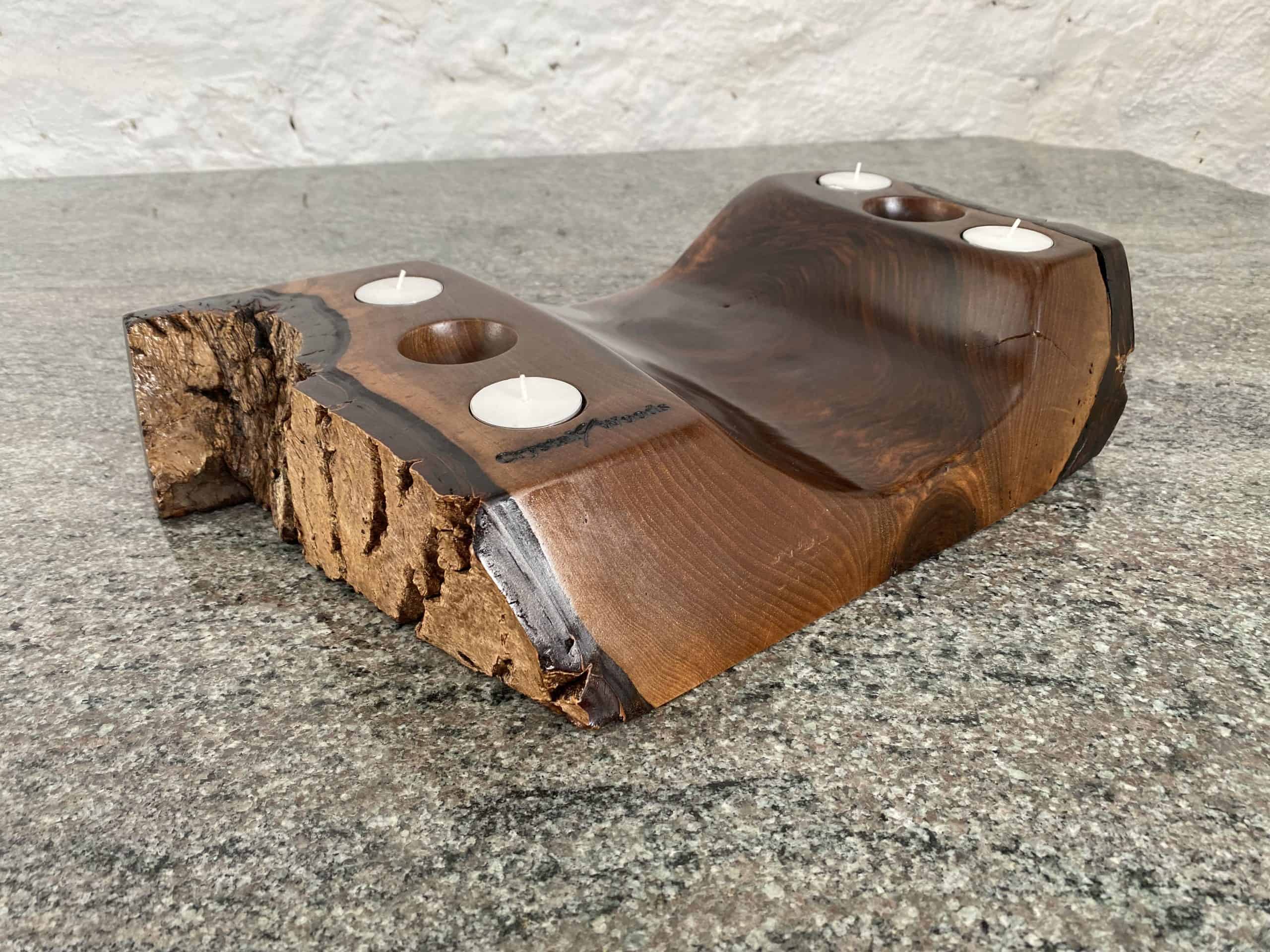 Live Edge Walnut Sculpture Piece 5 wonderful Close up view of this live edge detail English Walnut solid wood Tea Light Holder with 4 small candles and two spherical holes, handcrafted by Crystal Woods, finished to a high patina in oil