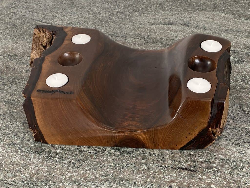 English Walnut Tea Light Holder with 4 small candles and two spherical holes, handcrafted by Crystal Woods with live edge detail, branded with their logo stamp