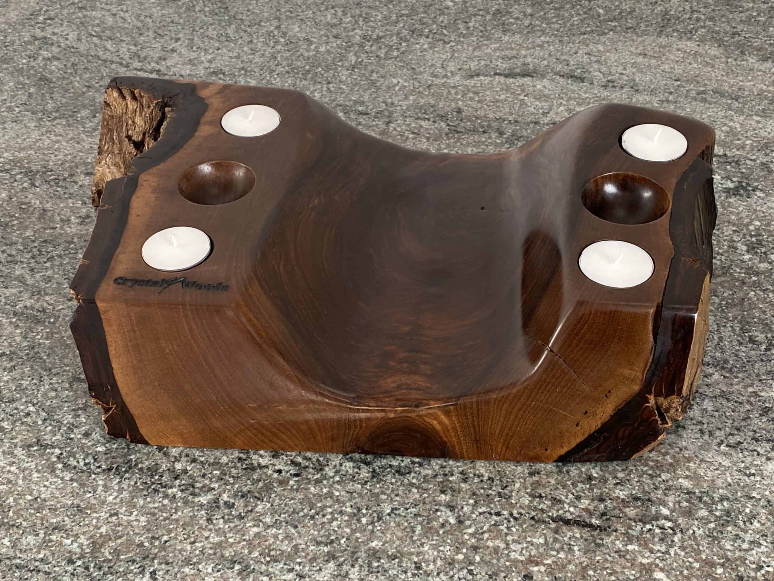 Live Edge Walnut Sculpture Piece 2 English Walnut Tea Light Holder with 4 small candles and two spherical holes, handcrafted by Crystal Woods with live edge detail, branded with their logo stamp
