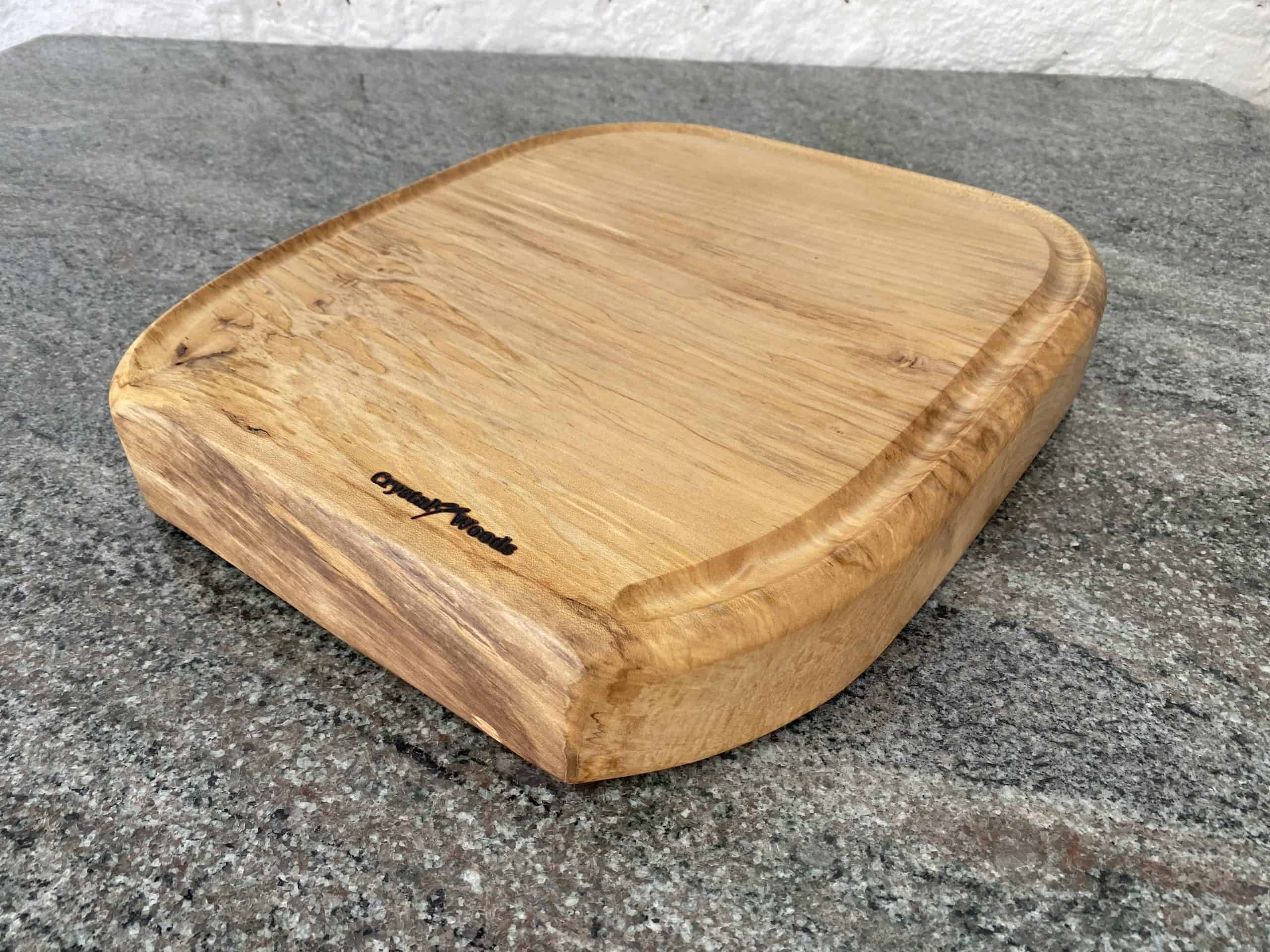 Sycamore Chopping Board - Horseshoe Shape 5 Close up view of this Sycamore Horseshoe Chopping Board, handcrafted by Crystal Woods, finished in food safe oil