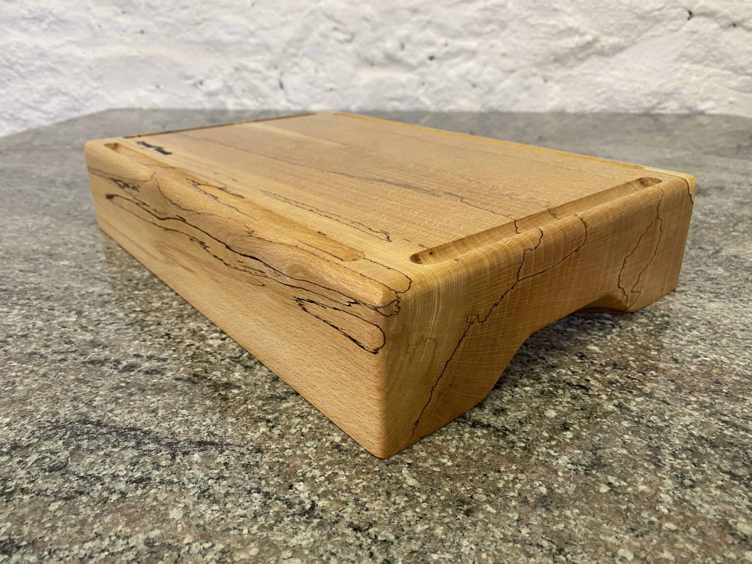Large Chunky Spalted Beech Chopping Board with 4 Crumb Grooves - Extra Thick 3 Close up view of a Large Chunky Spalted Beech Chopping Board with 4 Crumb Grooves – Extra Thick, from locally sourced wood in Devon