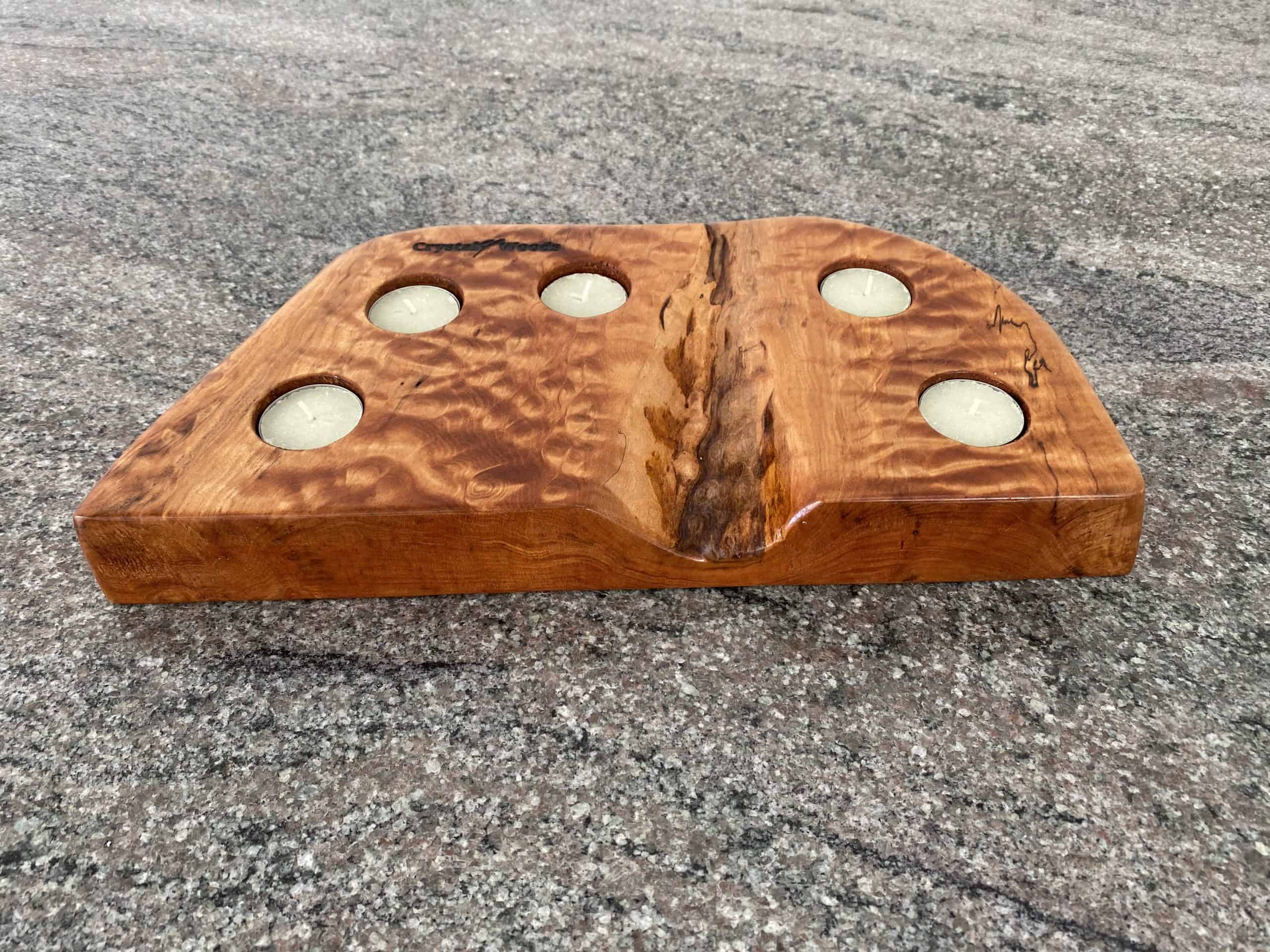 Ripple-Back Maple Tea Light Holder 3 Maple wood tea light holder with Ripple-back grain detail, holding 5 tea lights, finished in danish oil, branded with Crystal Woods logo stamp