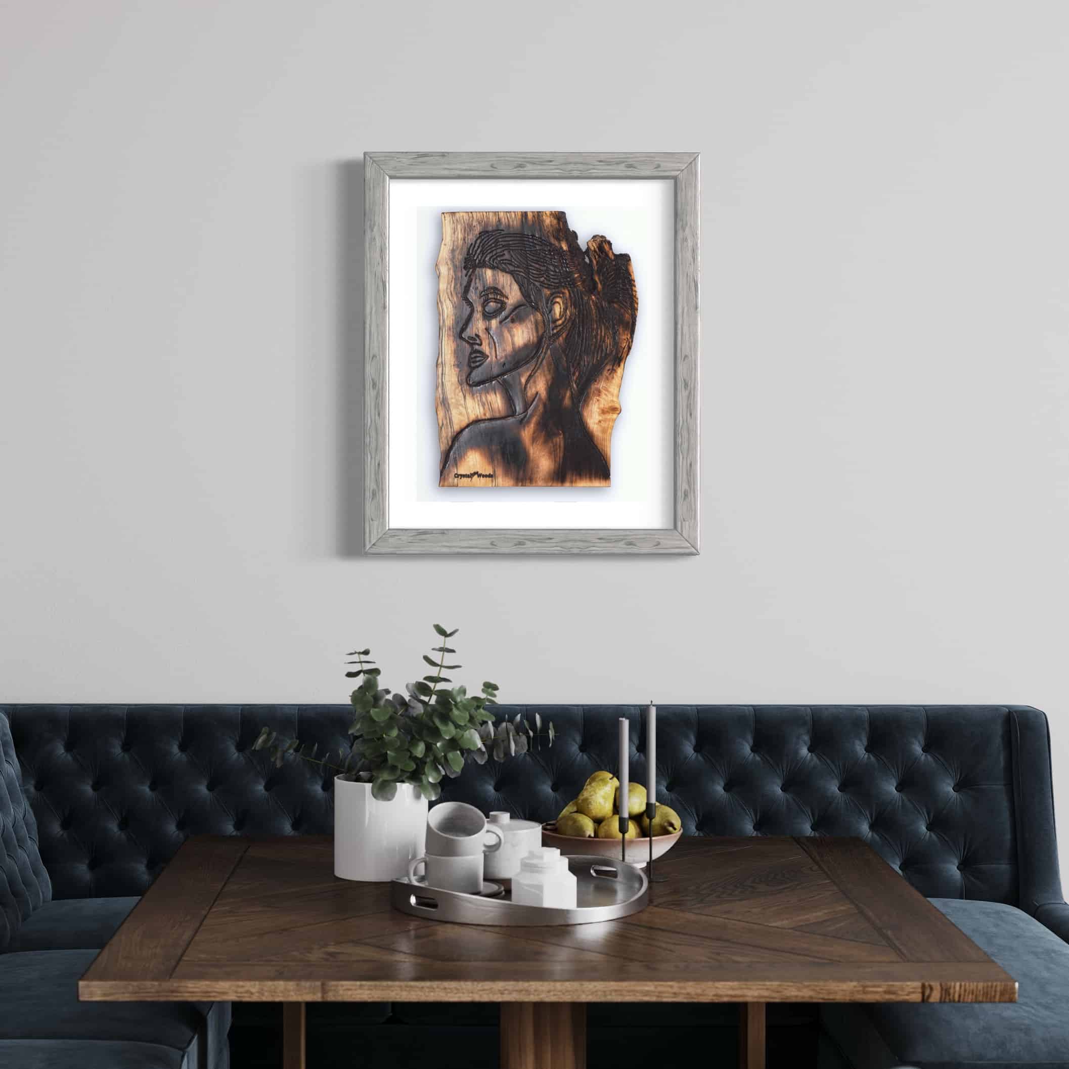 Fine Art Print - Alignment and Composure of a Goddess 5 Fine Art Giclee Print, limited edition of the Original Piece – Alignment and Composure of a Goddess, illustrated in a grey wood coloured frame with white background set on a pale grey wall in a dining room above a blue velvet corner sofa and dark wood table