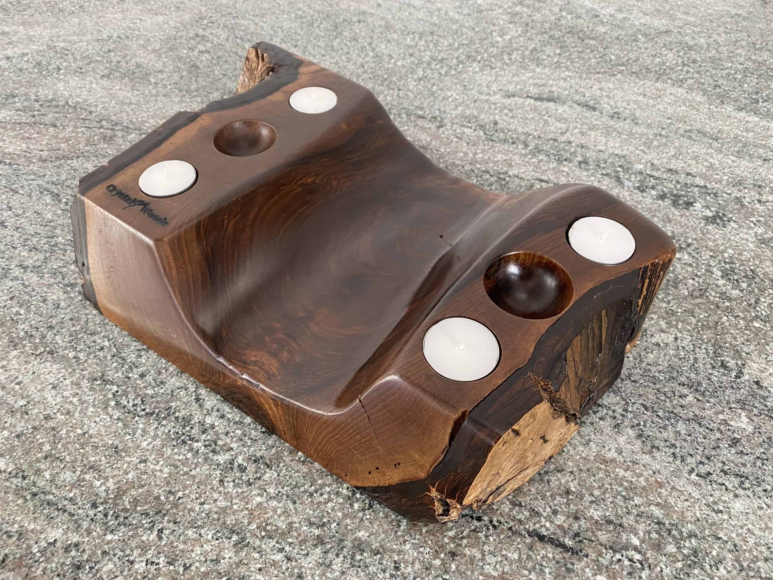Live Edge Walnut Sculpture Piece 6 Over view of this English Walnut Tea Light Holder with 4 small candles and two spherical holes, handcrafted by Crystal Woods with live edge detail