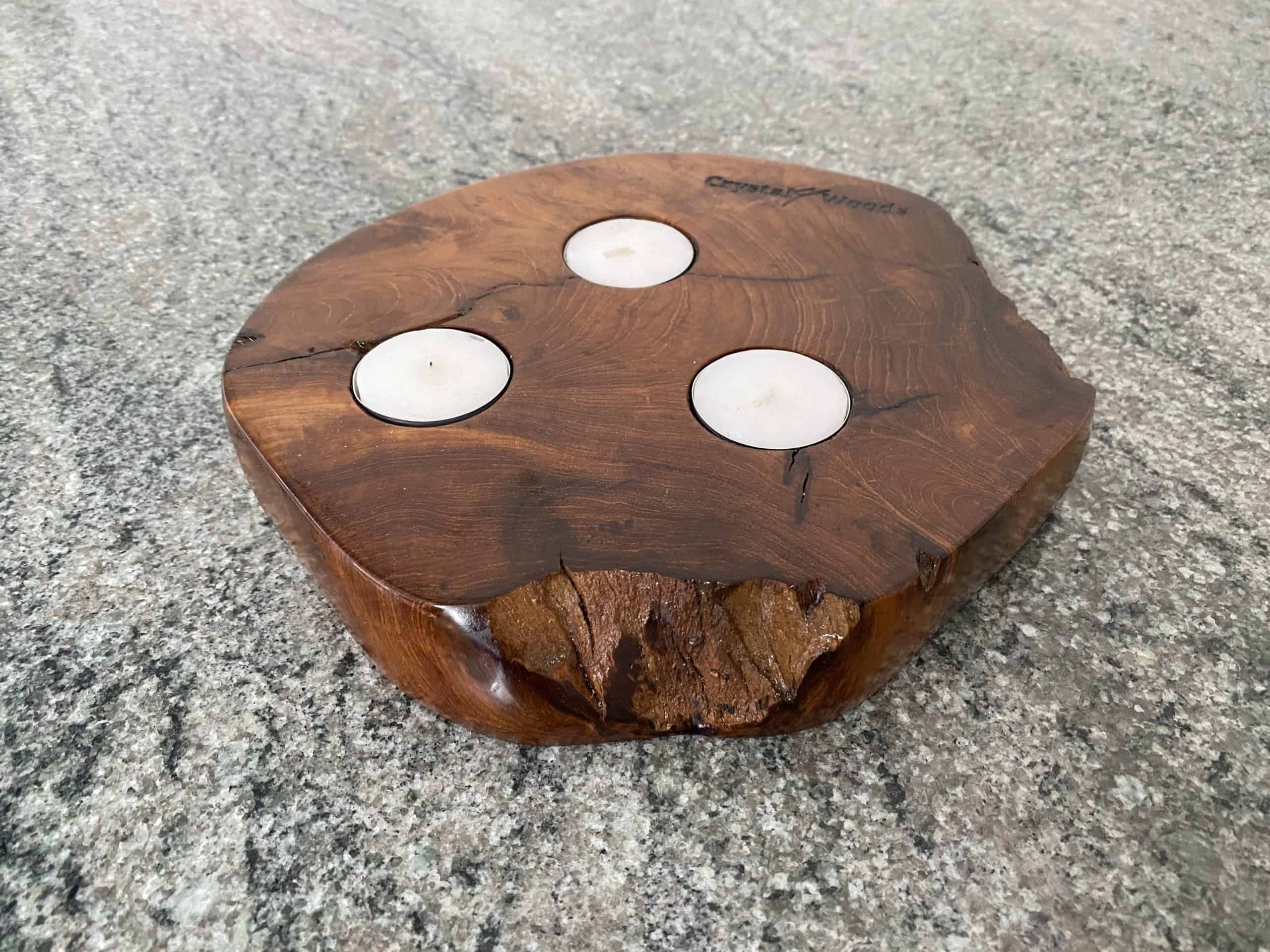 Three Tea Light Teak Candle Holder 3 A piece of Indonesian Teak holding 3 tea lights with deep rich grain colour and texture, finished in multiple coats of oil