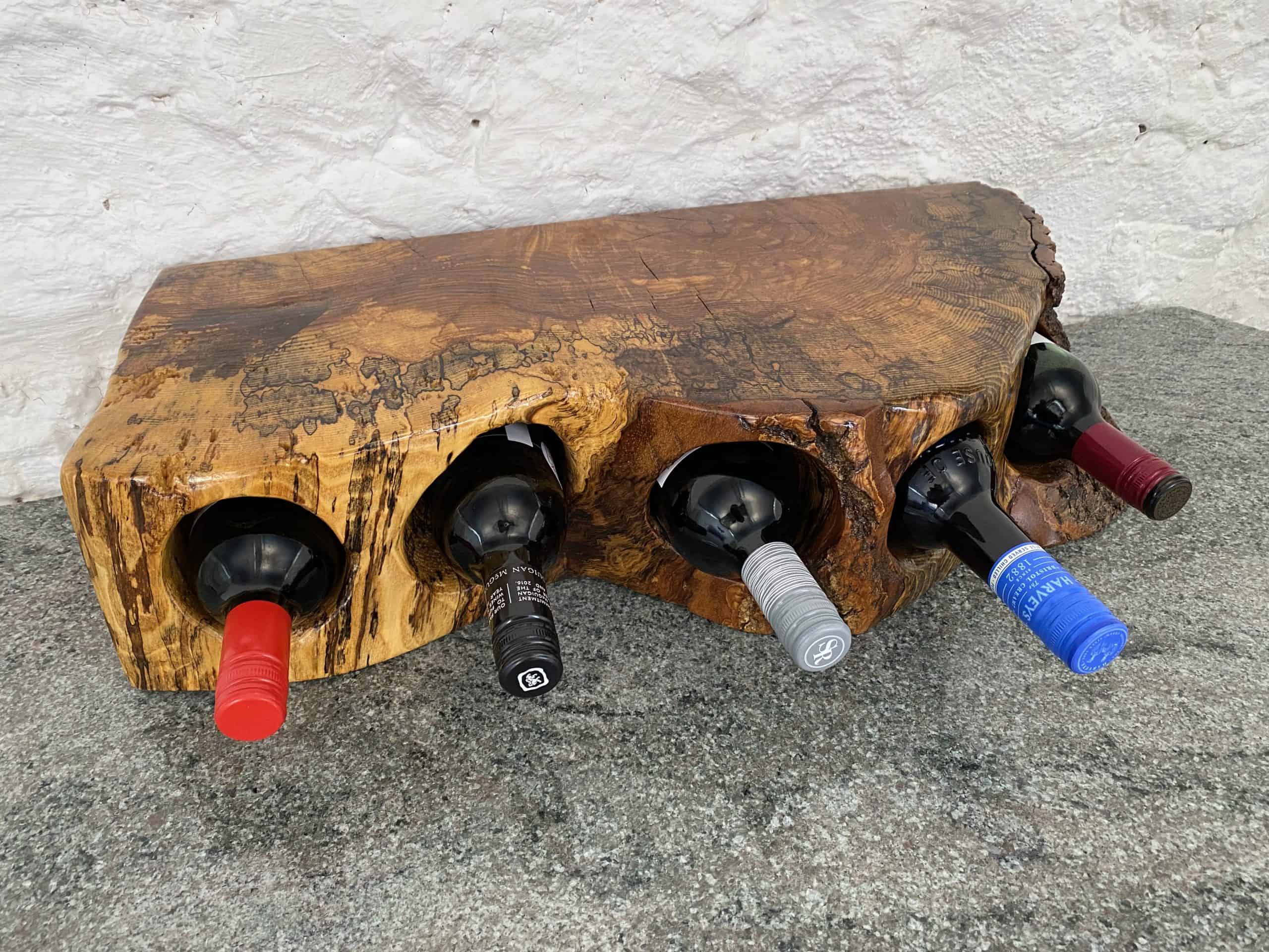 5 Bottle Spalted English Walnut Wine Rack 7 Spalted Walnut wine rack displaying 5 bottles, finished in multiple coats of oil to a high patina