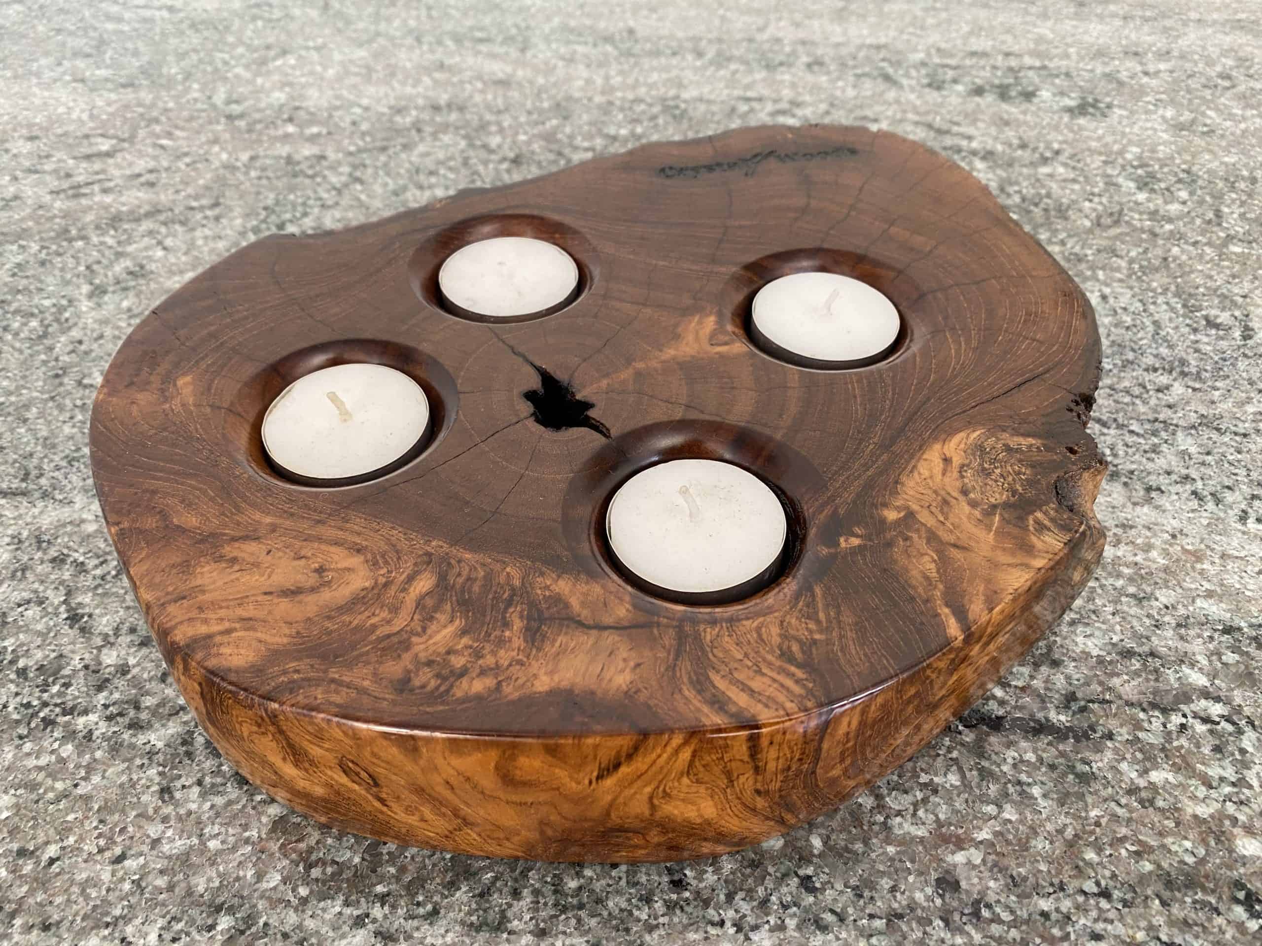 Indonesian Teak 4 Tea Light Holder 3 Teak Tea Light Holder with beautiful rich coloured grain texture holding Four small candles
