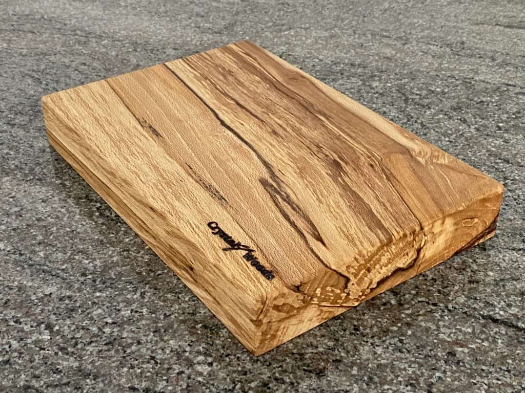 Small sleek and elegant Spalted Beech chopping board branded with Crystal Woods logo stamp