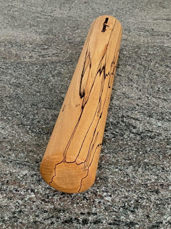 Over view of this Spalted Beech rolling pin capturing the unique black lines found in Spalted wood, hand turned by Crystal Woods