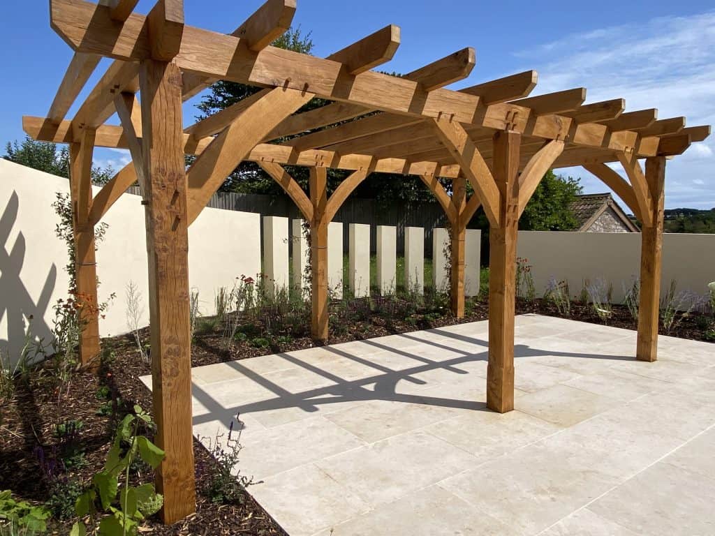 Oak Framed Pergolas 1 Stunning example of a Green Oak Frame Pergola on a landscape gardening project in Dawlish Devon, handcrafted by Crystal Woods