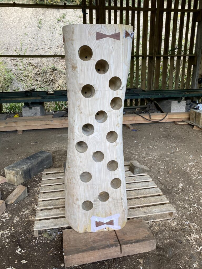 Tree Trunk Wine Racks being made