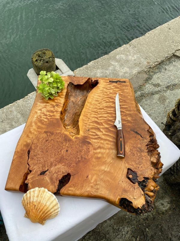 Birds eye and ripple back maple chopping board with live edge detail