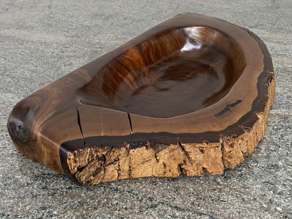 Handmade English Walnut Sculptured Reservoir Bowl with live edge detail, created by Crystal Woods, finished in danish oil, branded with their logo stamp