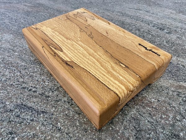 Over view of this Extra Thick chopping board made from locally sourced English Spalted Beech, with two straight flute crumb grooves, created by Crystal Woods, finished in food safe oil, branded with their logo stamp