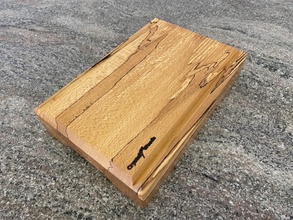 Over view shot of this Spalted Beech V-Joint Crumb Groove Chunky Chopping Board – Extra Thick, hand crafted by Crystal Woods, finished in food safe oil, branded with their logo stamp, locally sourced wood from Devon