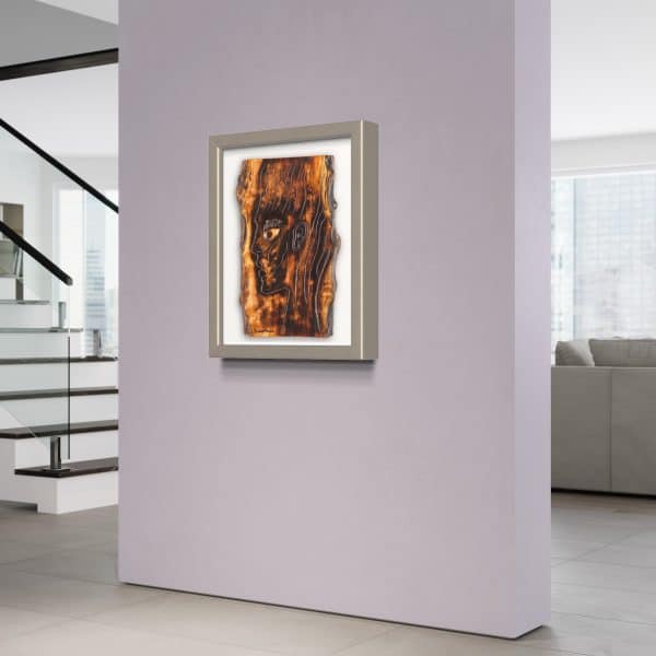 Fine Art Giclee Print of the Original Piece – The Energy Inside Me, a picture of a mans head illustrating the eternal flame of spirituality and the energy that resides within us all, shown in a silver grey frame and a white background set on a lilac colour wall