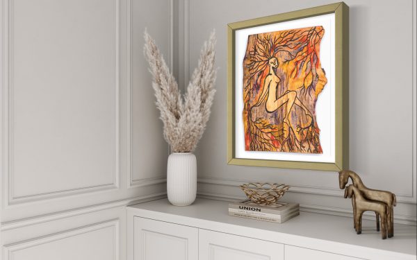 Close up angled view of this Fine Art Giclee print, limited edition, titled Rooted, illustrated in a olive green frame with a white back on a pale grey wall in a hall way setting, the picture shows a naked female connected to the roots of the forest by her hands, feet and hair