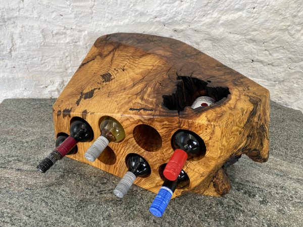 over view of this Wooden 8 bottle english spalted ash wine rack, handcrafted by Crystal Woods, finished in oil and branded with their logo stamp