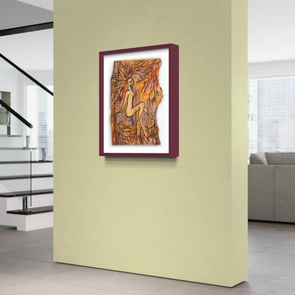 Fine Art Giclee print, limited edition, titled Rooted, illustrated in a cherry red frame with a white back on a lime green wall in a room setting, the picture shows a naked female connected to the roots of the forest by her hands, feet and hair