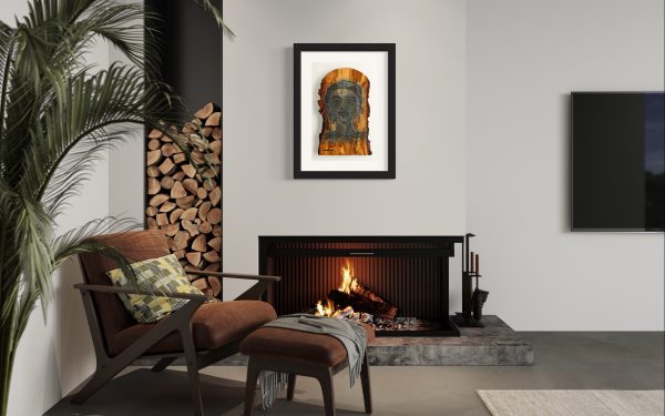 Limited edition Fine Art Giclee Print of the Original Piece titled Mystique, illustrated in a black frame with a white and grey background, set above a fire place on a pale grey wall with a front on view in a room setting with an arm chair