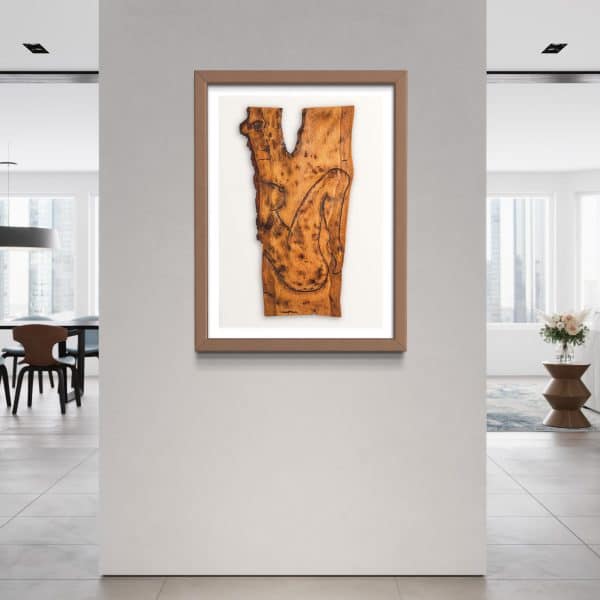 Fine Art Giclee Print of the Original Piece – Mania’s Connectedness, a limited edition run of 100, the picture shows a naked lady illustrating the profound essence of human form in tranquil contemplation and unshakable serenity. Set in a copper colour frame with a white background, set on pale grey wall.