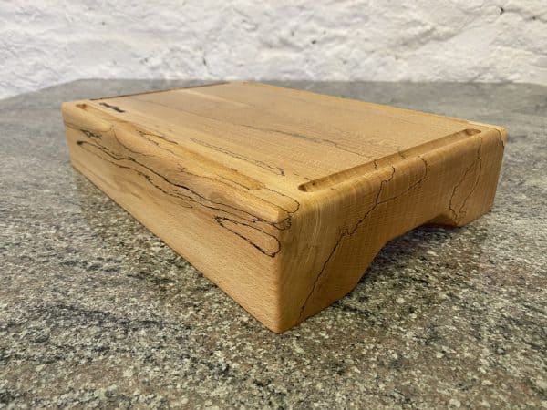 Close up view of a Large Chunky Spalted Beech Chopping Board with 4 Crumb Grooves – Extra Thick, from locally sourced wood in Devon