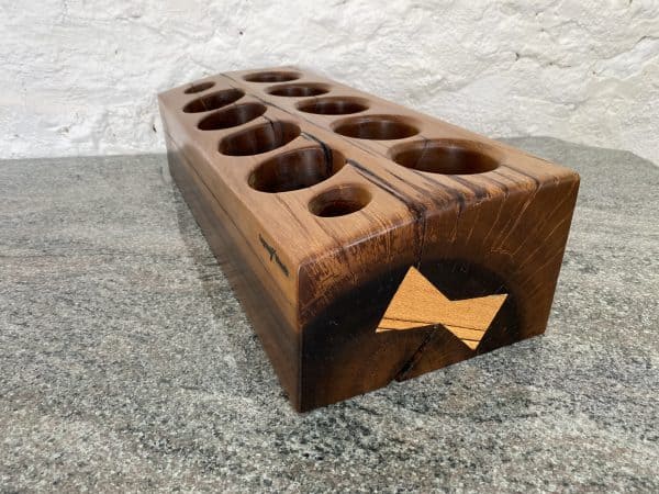 A robust piece of Greenheart wood as a display mini cocktail bar with bow ties from Spalted Beech on the ends to help stabilise the splits