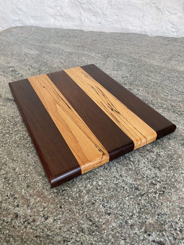 Sleek and slender cutting / chopping board made from two food safe species of wood, Panga Panga and Spalted Beech also finished in food safe oil, handcrafted by Crystal Woods